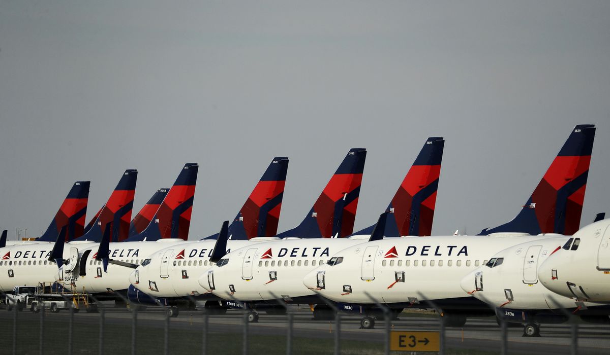 delta-air-strains-cancels-about-100-flights-opens-center-seat-dekyas